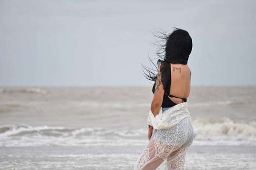 php mujer en la playa