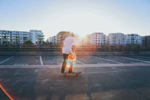 skateboarding-trick buildings  structure  condominium  people  man  skateboarding  sport