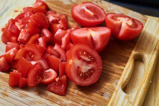 veganism chopped  tomatoes  cutting  board  closeup  red  rustic