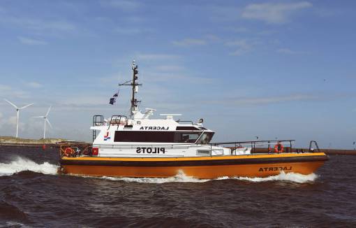 windmill coast guard  boat  water  sea  waves  windmills
