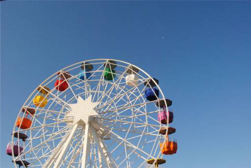 amusement ferris wheel  amusement park  ride  fair  fun  blue  sky
