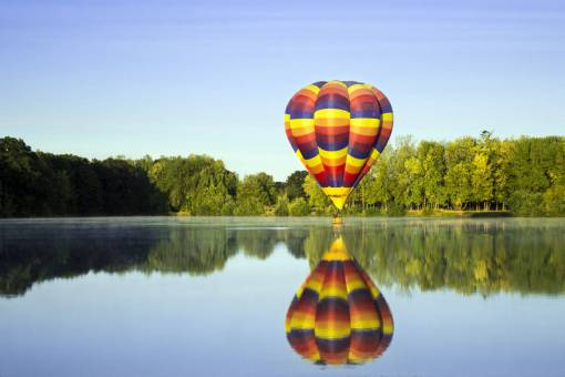 hot air balloon  lake  reflection  nature  outdoors  activity  flying