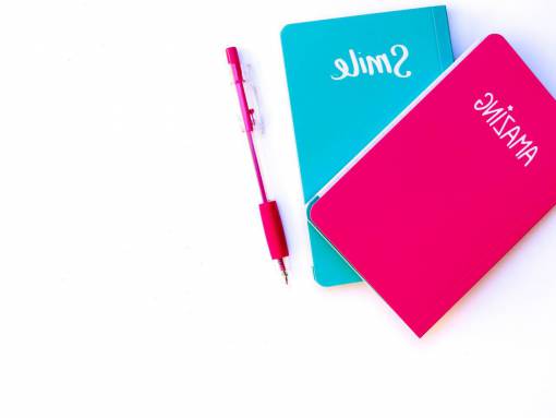 cuaderno pluma de cuaderno azul rosa escribir material escolar