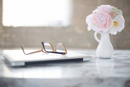 marble-rock reading  glasses  desk  laptop  flowers  office  table