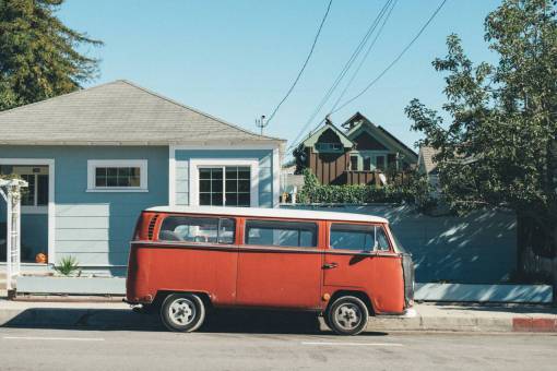 residential transportation  van  mini  bus  red  wheels  street