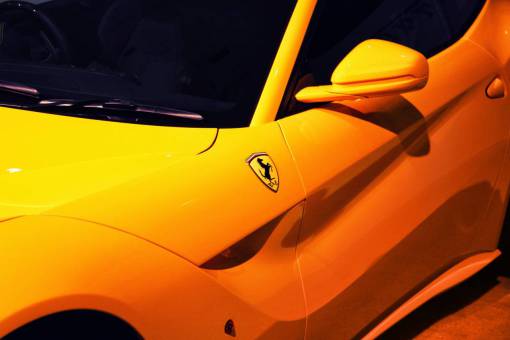 automobile-detail yellow  ferrari  car  supercar  automobile  transport  fast
