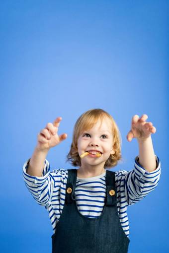 lifestyle cheerful child;food;tungs smiling caucasian ethnicity happiness child cute