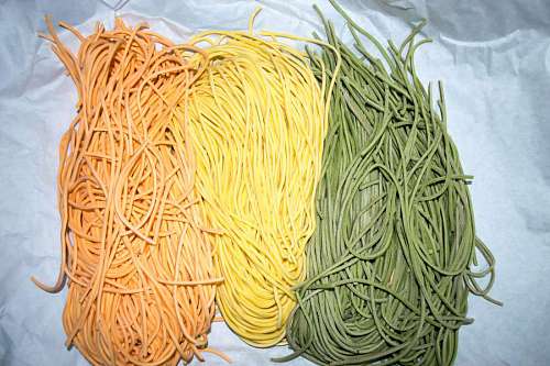 rolling-up-sleeves Colourful Italian pasta tagliatelle