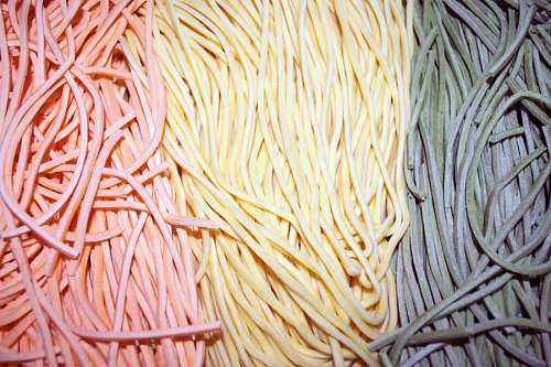 rolling-up-sleeves Colourful Italian pasta tagliatelle