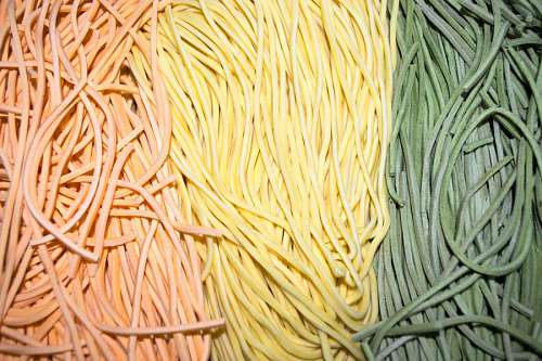 rolling-up-sleeves Colourful Italian pasta tagliatelle