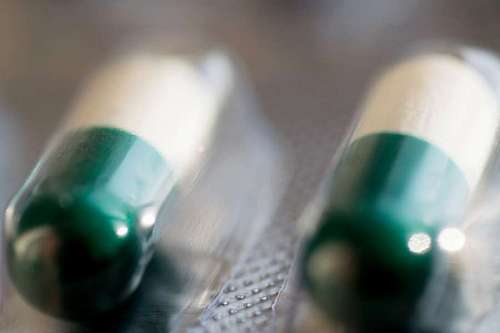 Macro heap of green pills