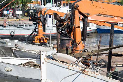 Ships with hydraulic arms in the Port of Buenos Aires, Argentina