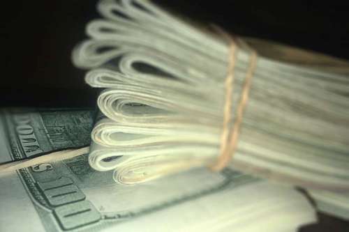 Stack of Rolled US Dollar Bills