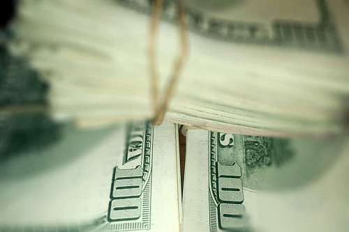 hundreds Stack of Rolled US Dollar Bills
