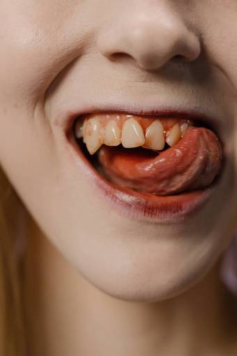 happy women mouth human teeth vampire;woman one person close-up human mouth