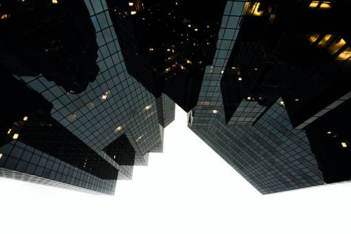 Building with mirrored glass seen from below