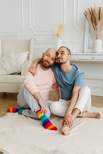 Couple hugging at home