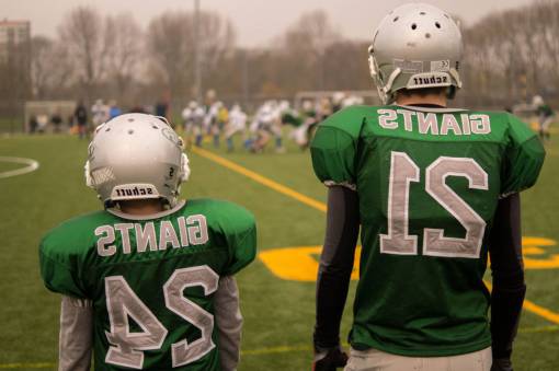 uniform football  teammates  giants  field  sports  athletes  uniform