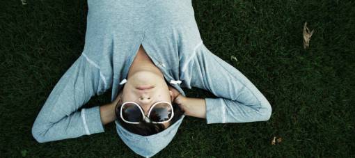 ground-coffee lying down  hoodie  sunglasses  grass  ground  people
