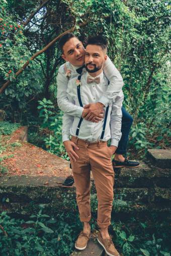 sex-symbol Gay couple hugging outdoors