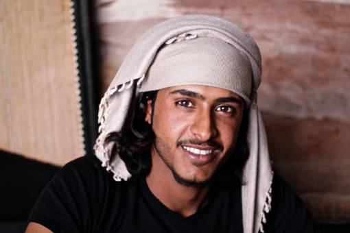 middle Portrait of a young man looking at the camera