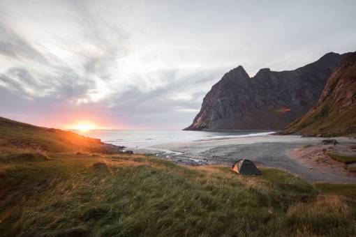 Tent on the beach at sunset