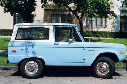 truck bronco  truck  suv  baby blue  wheels  tires  vintage