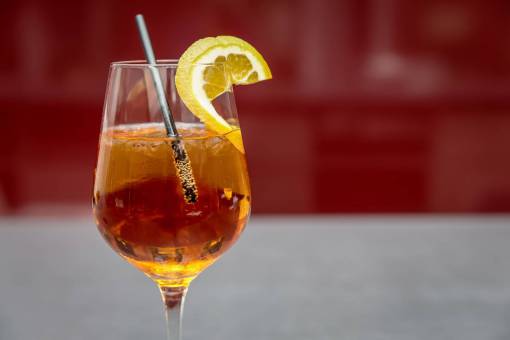 lemon glass  drink  straw  lemon  wedge  alcohol  cocktail