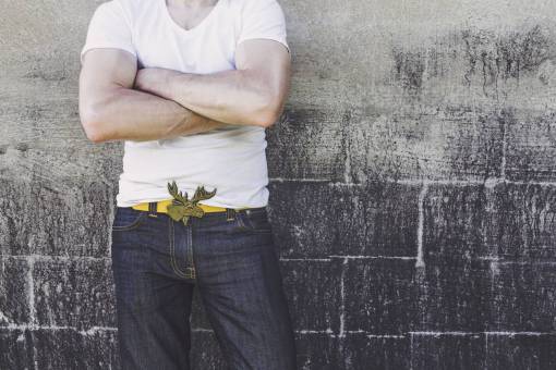 cross-country guy  man  cross arms  white  tshirt  vneck  yellow