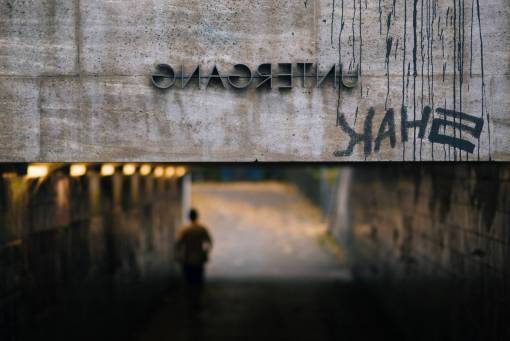 tunnel letters  dark  blur  people  man  walking  lights