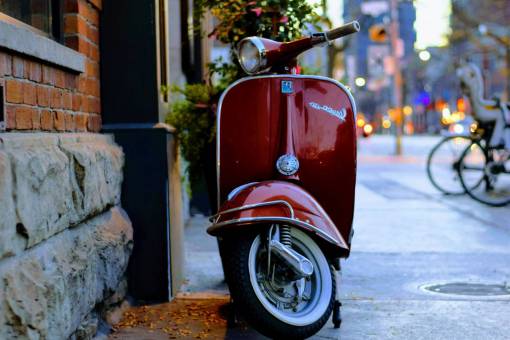motorcycle-racing motorcycle  vehicle  city  parking  building  wall  light