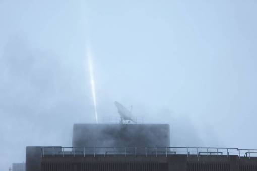 rooftop-pool rooftop  satellite dish  spotlight  beam  sky  clouds  smoke
