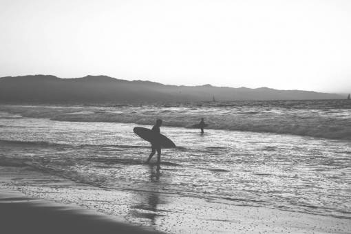 surfer surfing  surfer  surfboard  beach  sand  water  waves