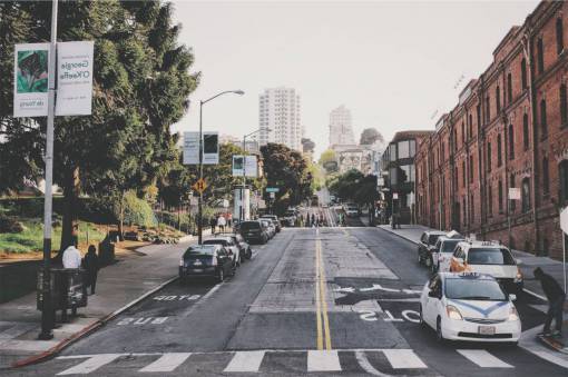 sidewalk taxis  cars  street  crosswalk  people  pedestrians  city