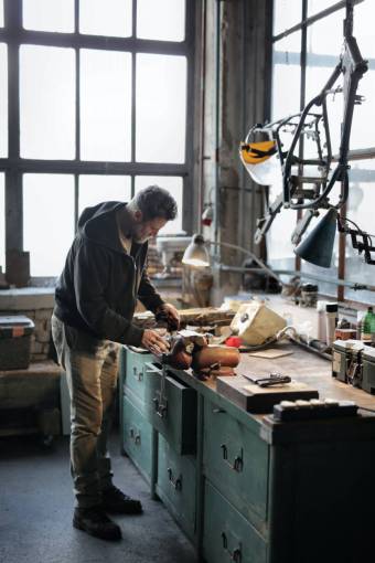standing-on-one-leg men working work tool occupation one person Charpenter;workshop carpenter