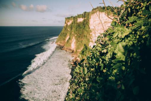cliff  ocean  waves  sea  blue  sky  clouds