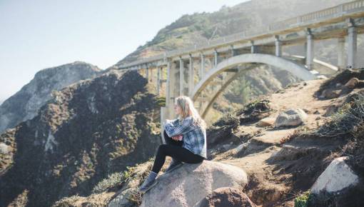 play people  woman  alone  rock  stone  infrastructure  bridge