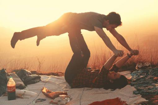 elevator woman  lifting  man  blanket  picnic  happy  sunset
