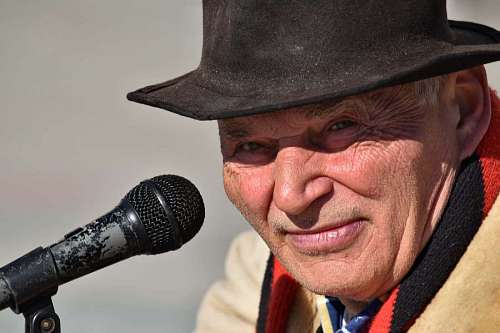 wrinkled elder microphone confidence face wrinkle performer speaking musician kb