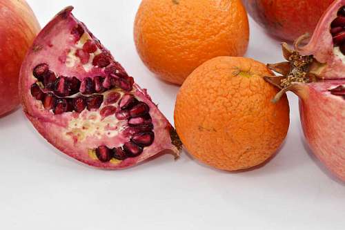 pomegranate section mineral fruit cross mandarin tangerine vitamins vegan healthy sweet 