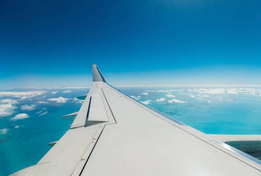 airline-travel airplane  airline  travel  trip  blue  sky  flight