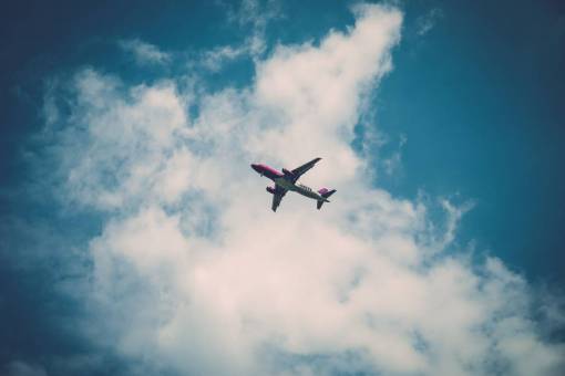airplane  blue  sky  clouds  travel  trip  transportation