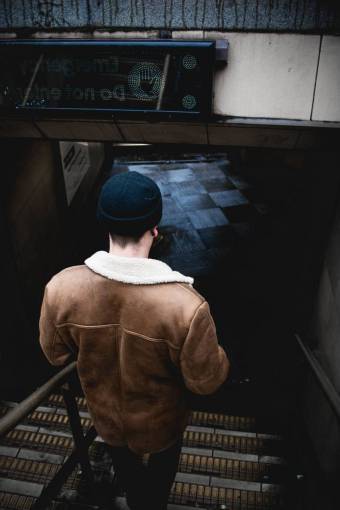checkered beanie  back  guy  man  people  stairs  floor