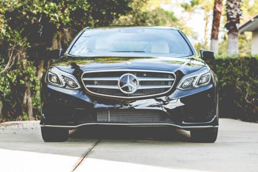 car  vehicle  headlights  bumper  black  windshield  trees