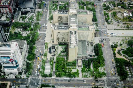 rooftop-pool city  aerial  view  green  grass  garden  trees