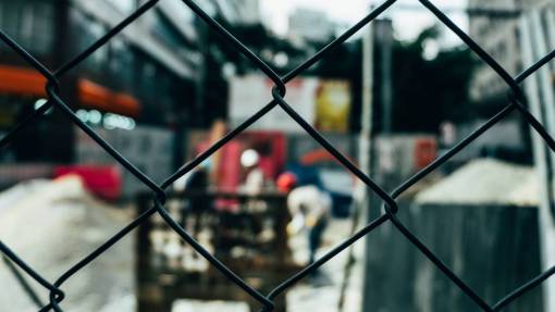 barrier fence  wire  barrier  construction  people  blur  bokeh
