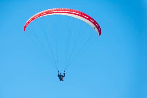 free-images paraglide  blue sky  fly  person  athlete  sport  free