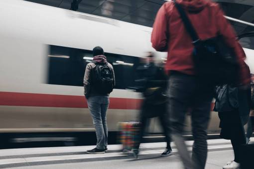people  men  waiting  passengers  travel  train  station