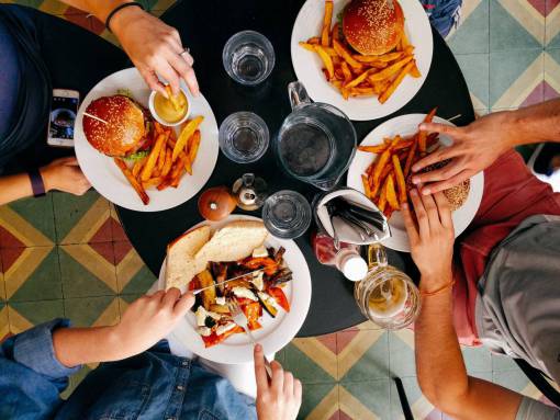 restaurant  people  men  women  eating  food  hamburger