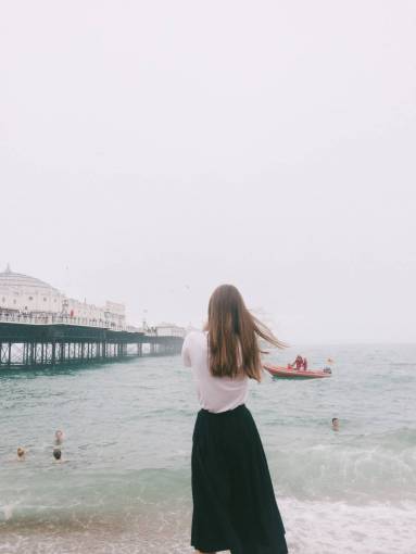 skirt woman  model  beach  cloudy  swim  pier  black